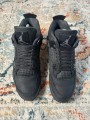 Air Jordan 4 black cat