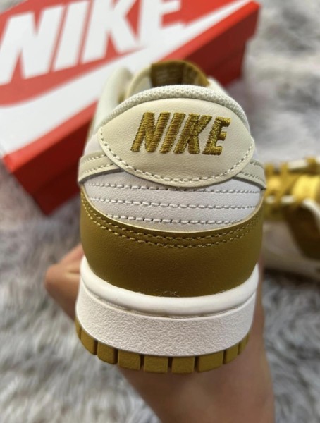Nike dunk low retro bronzine coconut milk cream yellow