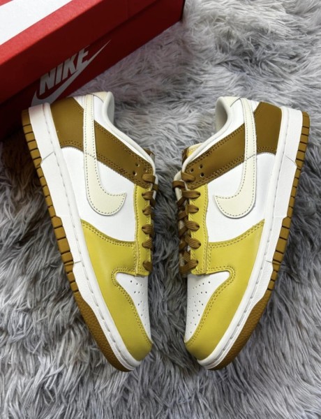Nike dunk low retro bronzine coconut milk cream yellow