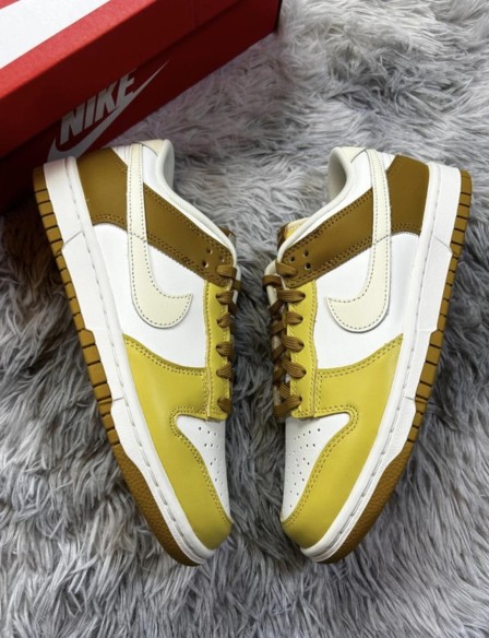 Nike dunk low retro bronzine coconut milk cream yellow