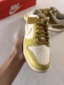 Nike dunk low retro bronzine coconut milk cream yellow