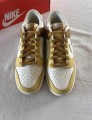 Nike dunk low retro bronzine coconut milk cream yellow