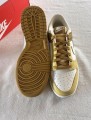 Nike dunk low retro bronzine coconut milk cream yellow