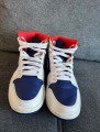 Jordan 1 mid bleu royal laser orange